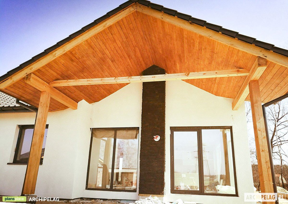 House Plan with Bonus Room and Indoor-Outdoor Fireplace